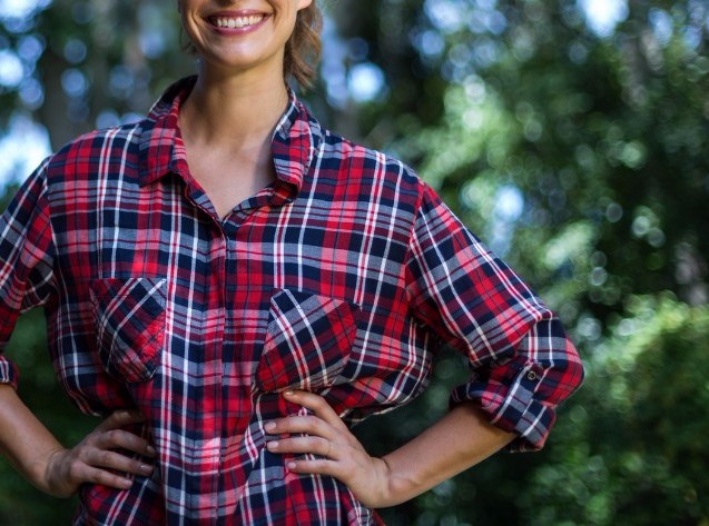 Woman smiling with her hands on her hips